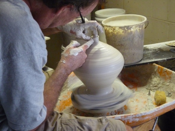 ... to a beautiful vase... carefully shaping the mouth of the vase