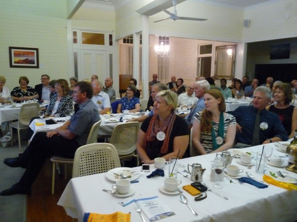 Rotarians listening attentively and participating in the presentation